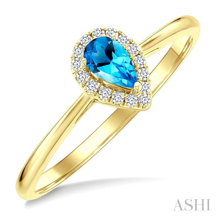 5x3 MM Pear Shape Blue Topaz and 1/20 Ctw Round Cut Diamond Halo Semi-Precious Ring in 14K Yellow Gold