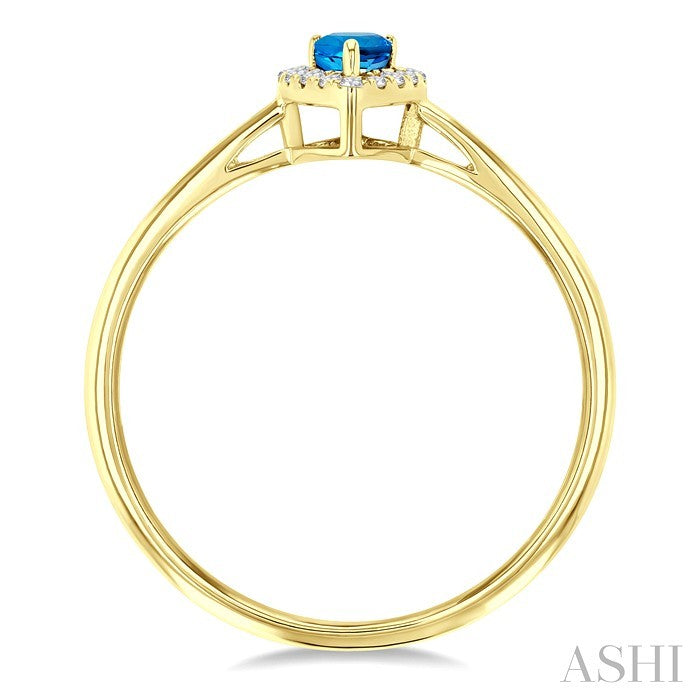5x3 MM Pear Shape Blue Topaz and 1/20 Ctw Round Cut Diamond Halo Semi-Precious Ring in 14K Yellow Gold