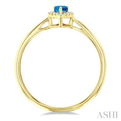 5x3 MM Pear Shape Blue Topaz and 1/20 Ctw Round Cut Diamond Halo Semi-Precious Ring in 14K Yellow Gold