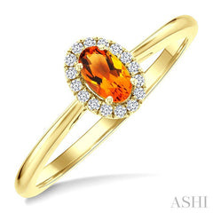 5x3 MM Oval Shape Citrine and 1/20 Ctw Round Cut Diamond Halo Semi-Precious Ring in 14K Yellow Gold