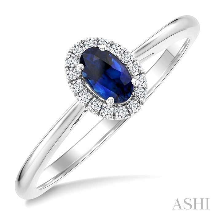 5x3 MM Oval Shape Sapphire and 1/20 Ctw Round Cut Diamond Halo Precious Ring in 14K White Gold