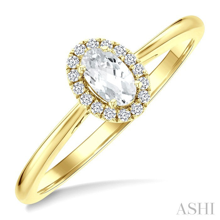 5x3 MM Oval Shape White Topaz and 1/20 Ctw Round Cut Diamond Halo Semi-Precious Ring in 14K Yellow Gold