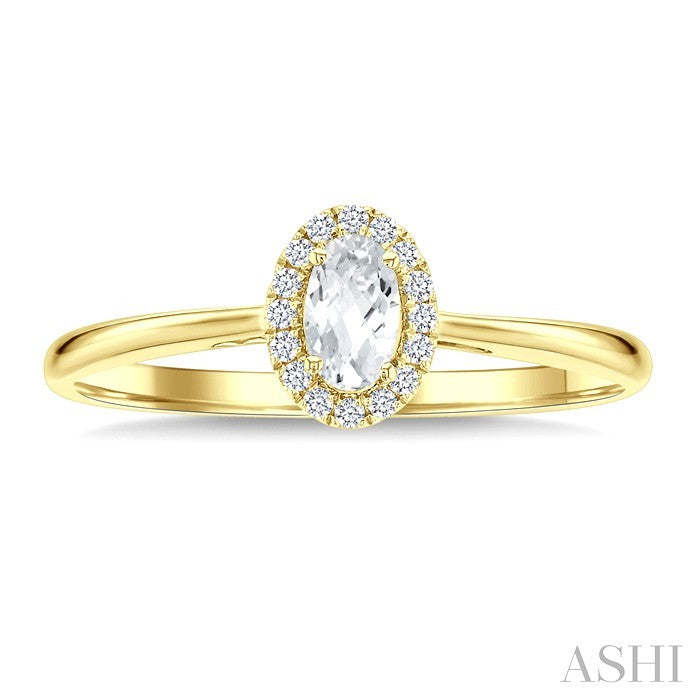 5x3 MM Oval Shape White Topaz and 1/20 Ctw Round Cut Diamond Halo Semi-Precious Ring in 14K Yellow Gold