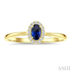 5x3 MM Oval Shape Sapphire and 1/20 Ctw Round Cut Diamond Halo Precious Ring in 10K Yellow Gold