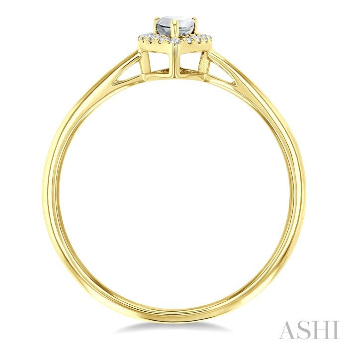 5x3 MM Pear Shape White Topaz and 1/20 Ctw Round Cut Diamond Halo Semi-Precious Ring in 10K Yellow Gold