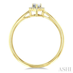 5x3 MM Pear Shape White Topaz and 1/20 Ctw Round Cut Diamond Halo Semi-Precious Ring in 10K Yellow Gold