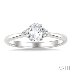 1/20 Ctw Oval Cut 6X4 MM White Topaz and Round Cut Diamond semi-precious Ring in 10K White Gold