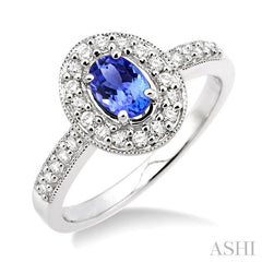 6x4mm Oval Cut Tanzanite and 1/4 Ctw Round Cut Diamond Ring in 14K White Gold