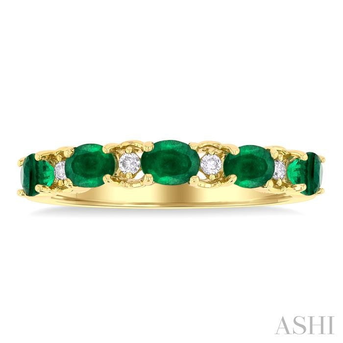 4x3 MM East-West Set Oval Cut Emerald and 1/20 Ctw Round Cut Diamond Precious Band in 14K Yellow Gold
