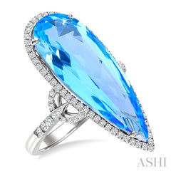 26X10 MM Pear Cut Blue Topaz and 1/2 Ctw Round Cut Diamond Halo Semi-Precious Ring in 14K White Gold