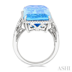 26x12 MM Emerald Cut Blue Topaz and 1/2 Ctw Round Cut Diamond Halo Semi-Precious Ring in 14K White Gold