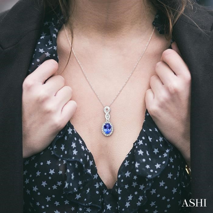 6x4 MM Oval Cut Tanzanite and 1/10 Ctw Round Cut Diamond Pendant in 10K White Gold with Chain