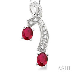 5x4 MM Oval Cut Ruby and 1/6 Ctw Round Cut Diamond Precious Pendant in 14K White Gold with Chain