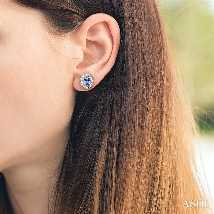 4x3 MM Oval Shaped Tanzanite and 1/10 Ctw Round Cut Diamond Earrings in 14K Yellow Gold