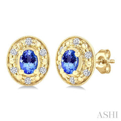 4x3 MM Oval Shaped Tanzanite and 1/10 Ctw Round Cut Diamond Earrings in 14K Yellow Gold