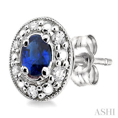 4x3 MM Oval Shaped Sapphire and 1/10 Ctw Round Cut Diamond Earrings in 10K White Gold