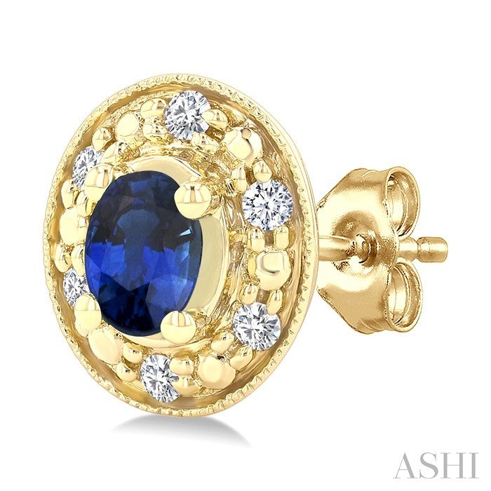 4x3 MM Oval Shaped Sapphire and 1/10 Ctw Round Cut Diamond Earrings in 10K Yellow Gold