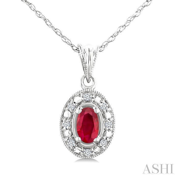 5x3 MM Oval Shape Ruby and 1/20 Ctw Round Cut Diamond Pendant in 10K White Gold with Chain.