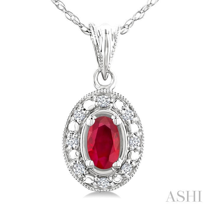 5x3 MM Oval Shape Ruby and 1/20 Ctw Round Cut Diamond Pendant in 10K White Gold with Chain.