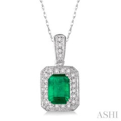6x4 MM Emerald Shape Emerald and 1/5 Ctw Round Cut Diamond Pendant in 14K White Gold with Chain