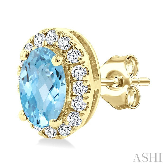 5x3 MM Oval Shape Aquamarine and 1/8 Ctw Round Cut Diamond Halo Semi-Precious Stud Earrings in 14K Yellow Gold
