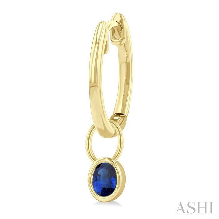 5x3 MM Bezel Set Oval Cut Sapphire Precious Fashion Huggie Earrings in 10K Yellow Gold