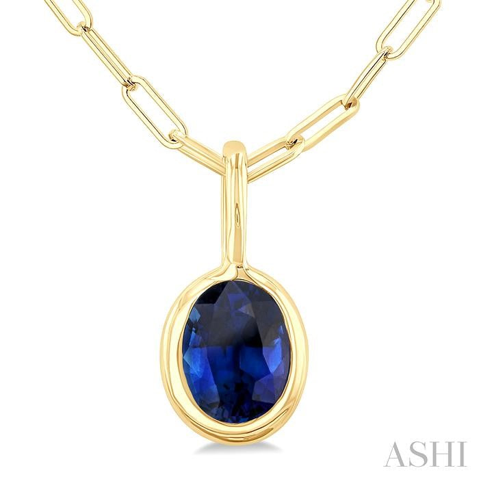 6x4 MM Bezel Set Oval Cut Sapphire Precious Fashion Pendant With Paperclip Chain in 10K Yellow Gold