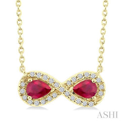 4X3 MM Pear Shape Ruby and 1/10 Ctw Round Cut Diamond Precious Infinite Halo Pendant With Chain in 10K Yellow Gold