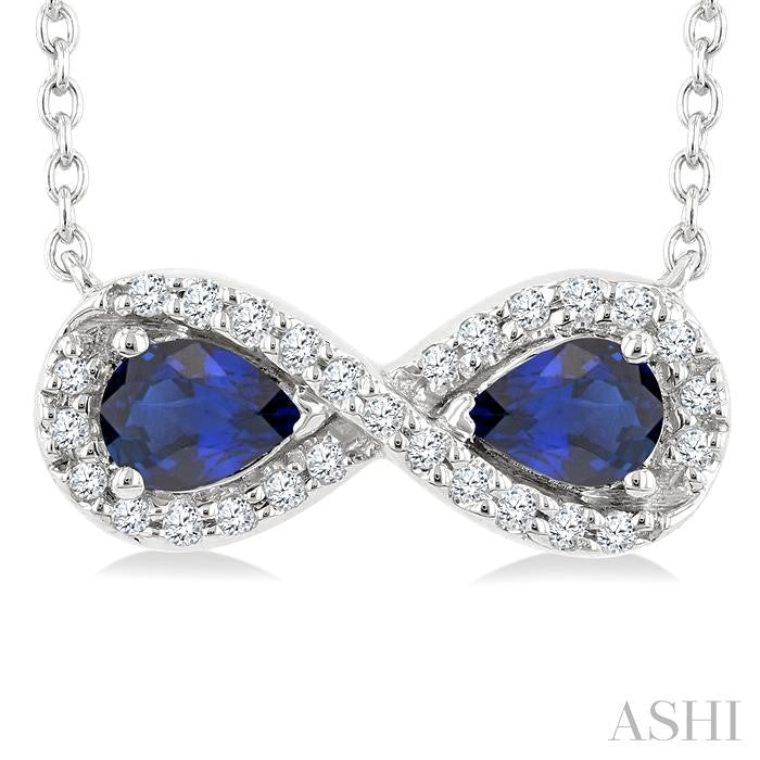 4X3 MM Pear Shape Sapphire and 1/10 Ctw Round Cut Diamond Precious Infinite Halo Pendant With Chain in 10K White Gold