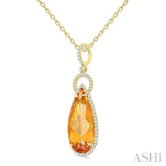 22X10 MM Pear Cut Citrine and 1/3 Ctw Round Cut Diamond Halo Semi-Precious Pendant With Chain in 14K Yellow Gold