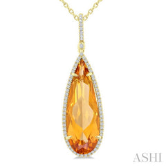 26x9 MM Pear Cut Citrine and 1/4 Ctw Round Cut Diamond Halo Semi-Precious Pendant With Chain in 14K Yellow Gold