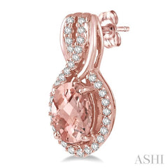 7x5 MM Oval Cut Morganite and 1/5 Ctw Round Cut Diamond Entwined Semi-Precious Earrings in 14K Rose Gold