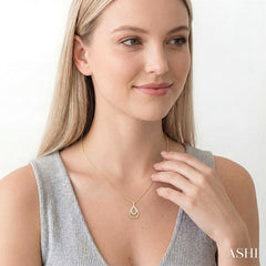 1/10 Ctw Overlay Pear Shaped Frame Round Cut Diamond Fashion Drop Petite Pendant With Chain in 10K Yellow Gold