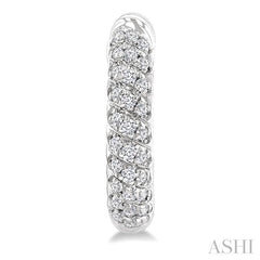1/5 Ctw Petite Swirl Pattern Round Cut Diamond Fashion Huggies in 10K White Gold
