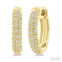 1/5 Ctw Petite Swirl Pattern Round Cut Diamond Fashion Huggies in 10K Yellow Gold