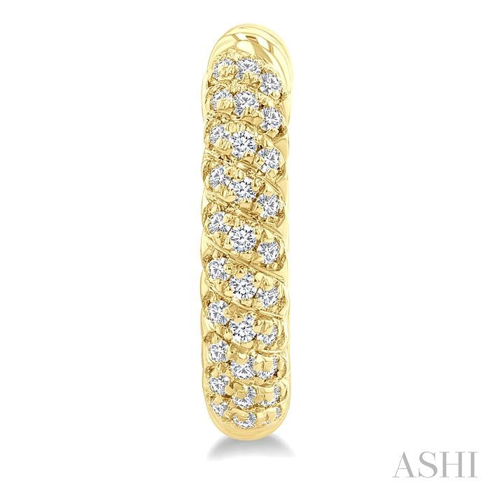 1/5 Ctw Petite Swirl Pattern Round Cut Diamond Fashion Huggies in 10K Yellow Gold