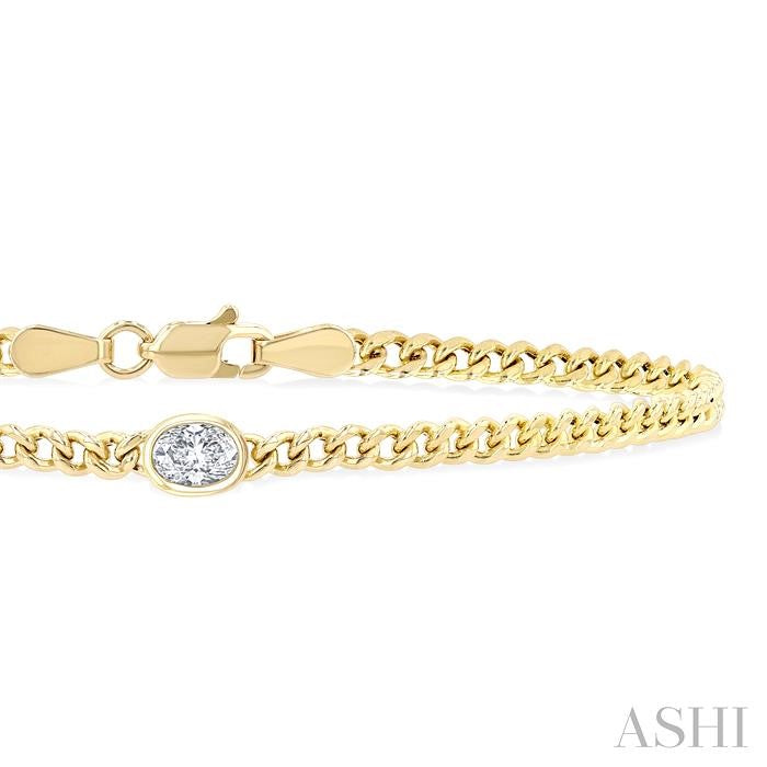 1/4 Ctw Bezel Set Oval Cut Diamond Curb Link Fashion Bracelet in 14K Yellow Gold