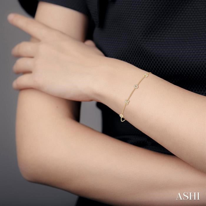 1/5 Ctw 'XO' Hugs and Kisses Round Cut Diamond Station Bracelet in 10K Yellow Gold