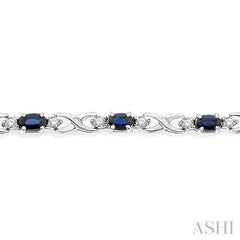 5x3 MM Oval Cut Sapphire and 1/10 Ctw Round Cut Diamond Bracelet in 10K White Gold