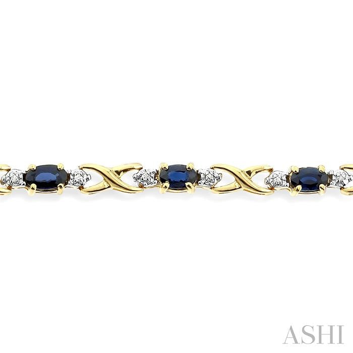 5x3 MM Oval Cut Sapphire and 1/10 Ctw Round Cut Diamond Bracelet in 10K Yellow Gold