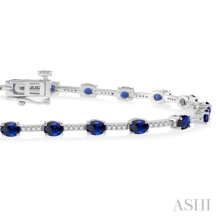 4x3 MM Oval Cut Sapphire and 1/3 Ctw Round Cut Diamond Precious Bracelet in 10K White Gold