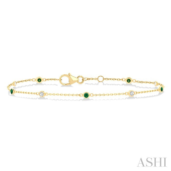 1.8 MM Emerald and 1/10 Ctw Bezel Set Round Cut Diamond Precious Gemstone Station Bracelet in 14K Yellow Gold