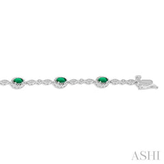 5x3 MM Oval Cut Emerald and 1/20 Ctw Round Cut Diamond Bracelet in 10K White Gold