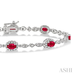 5x3 MM Oval Cut Ruby and 1/20 Ctw Round Cut Diamond Bracelet in 10K White Gold