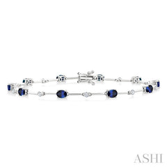 4x3 MM Oval Cut Sapphire and 1/3 Ctw Round Cut Diamond Precious Bar Bracelet in 10K White Gold