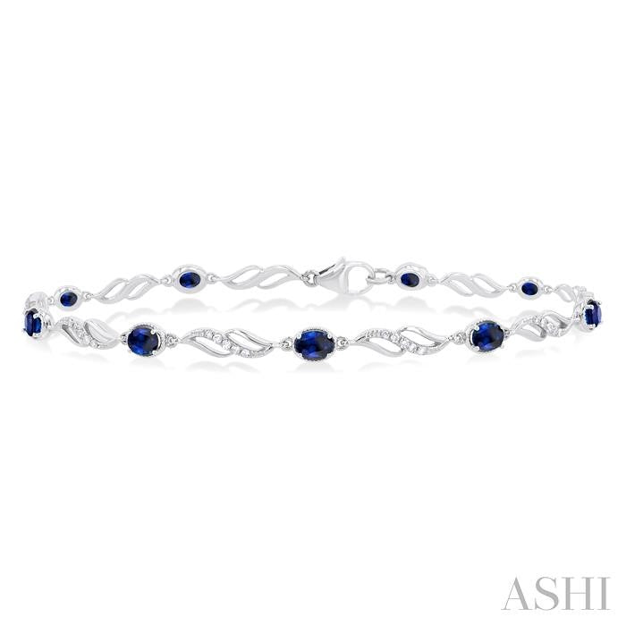 4X3 MM Oval Cut Sapphire and 1/5 Ctw Round Cut Diamond Precious Eternity Link Tennis Bracelet in 10K White Gold