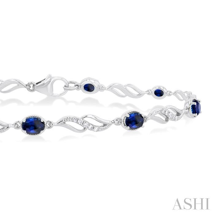 4X3 MM Oval Cut Sapphire and 1/5 Ctw Round Cut Diamond Precious Eternity Link Tennis Bracelet in 10K White Gold