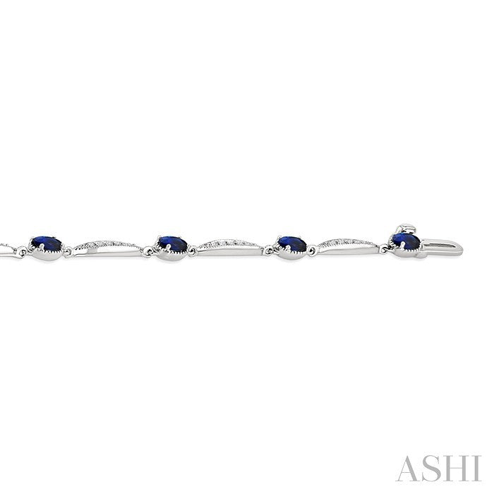 4X3 MM Oval Cut Sapphire and 1/4 Ctw Round Cut Diamond Precious Bracelet in 10K White Gold