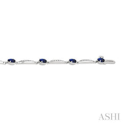 4X3 MM Oval Cut Sapphire and 1/4 Ctw Round Cut Diamond Precious Bracelet in 10K White Gold