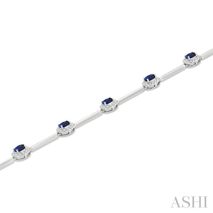 4x3 MM Oval Cut Sapphire and 1/2 Ctw Round Cut Diamond Halo Precious Bar Link Bracelet in 10K White Gold